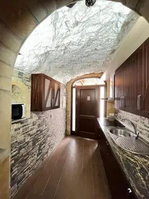 Una cocina o zona de cocina en La casita medieval