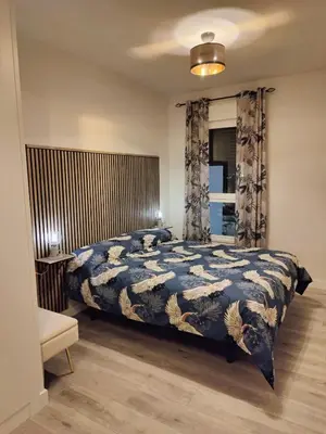 Cama o camas de una habitación en Apartamento cercano al Metro