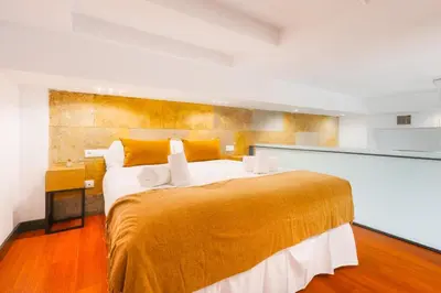Cama o camas de una habitación en Modern Duplex - Loft Style - Historic Centre