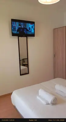 Cama o camas de una habitación en Habitaciones con baños privados a 10 minutos de la Catedral en zona de aparcamientos gratis