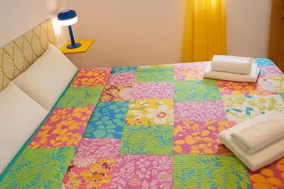 Cama o camas de una habitación en Habitaciones con baños privados a 10 minutos de la Catedral en zona de aparcamientos gratis