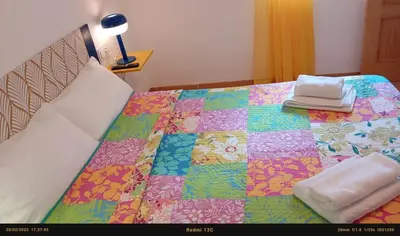 Cama o camas de una habitación en Habitaciones con baños privados a 10 minutos de la Catedral en zona de aparcamientos gratis