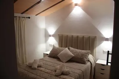Cama o camas de una habitación en Ático de la Miel