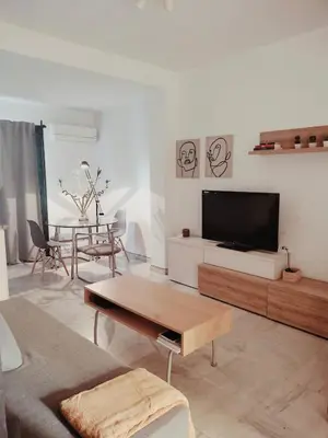 Una televisión o centro de entretenimiento en Apartamento-Loft Centro Ciudad