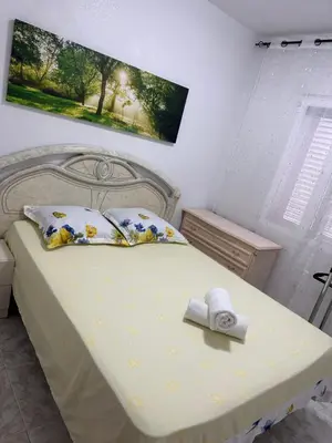 Cama o camas de una habitación en Apartament Luxor