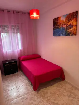 Cama o camas de una habitación en Apartament Luxor