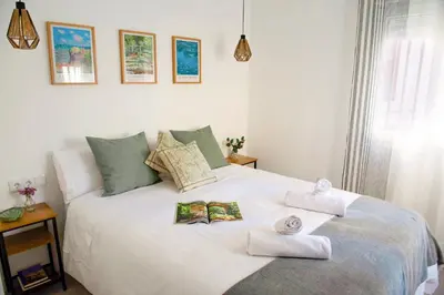 Cama o camas de una habitación en Optimum Alma del Centro Boutique