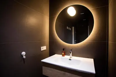 Un baño de WISH SUITE Puerta Osario