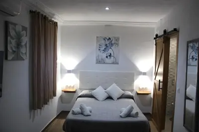 Cama o camas de una habitación en El Rincón de la Miel