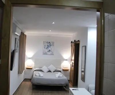 Cama o camas de una habitación en El Rincón de la Miel