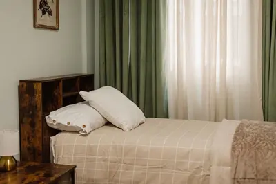 Cama o camas de una habitación en Americahome