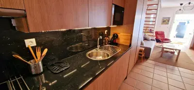 Una cocina o zona de cocina en Casa en El Pedroso de tres habitaciones