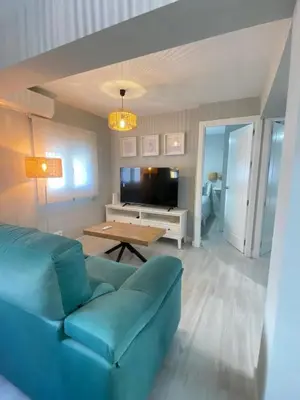 Una televisión o centro de entretenimiento en Macarena Boutique Apartment