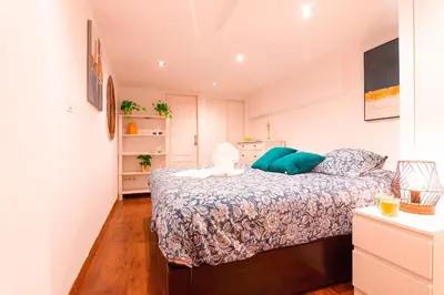 Cama o camas de una habitación en Edomus Santiago Duplex