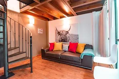 Zona de estar de Edomus Santiago Duplex