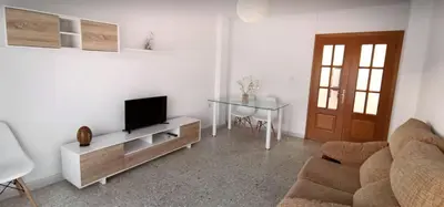 Una televisión o centro de entretenimiento en Apartamento Guadalrio