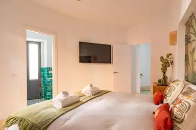 Cama o camas de una habitación en Ohliving Muro de los Navarros