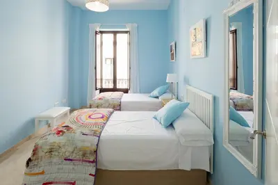 Cama o camas de una habitación en Veoapartment Jesús del Gran Poder B