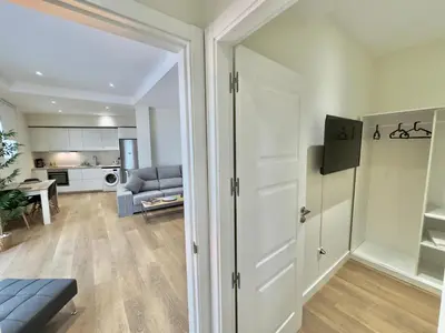 Una televisión o centro de entretenimiento en ApartHome SanRomán