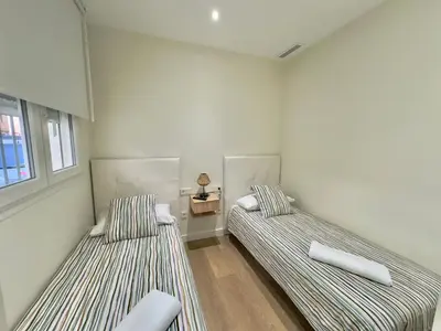 Cama o camas de una habitación en ApartHome SanRomán