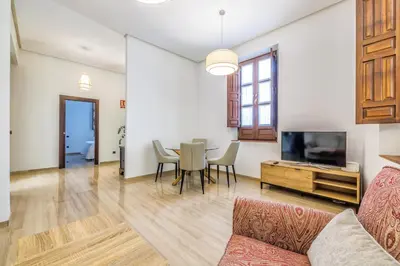 Una televisión o centro de entretenimiento en Apartamento Viana & Centro Histórico