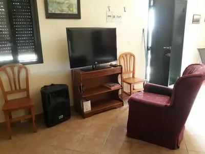 Una televisión o centro de entretenimiento en Casa rural Los conde