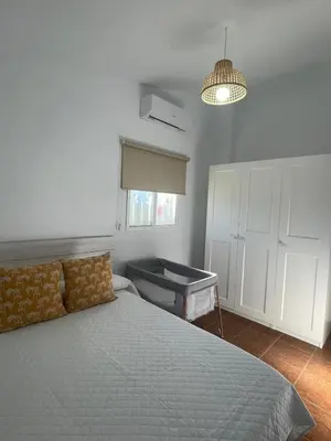 Cama o camas de una habitación en Casa Rural El Almendro