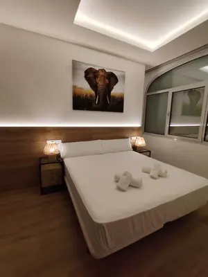 Cama o camas de una habitación en DreamsApt Feria