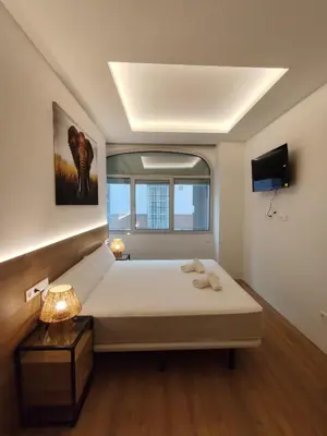 Cama o camas de una habitación en DreamsApt Feria