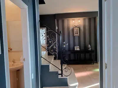 Un baño de Los Claveles