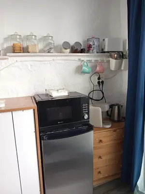 Una cocina o zona de cocina en La Casa del Patio ATQ