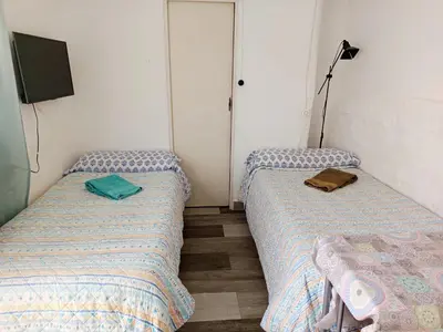 Cama o camas de una habitación en La Casa del Patio ATQ