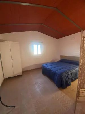 Cama o camas de una habitación en Olimpya Rural Apartments