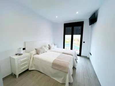 Cama o camas de una habitación en Allegro - Apartamentos La Clave