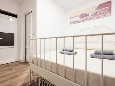 Cama o camas de una habitación en Benitez Parodi Recién reformado zona multicultural