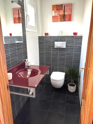 Un baño de Bonita casa adosada