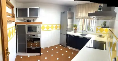 Una cocina o zona de cocina en Bonita casa adosada
