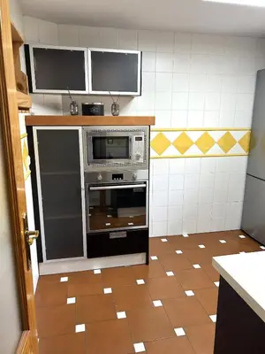 Una cocina o zona de cocina en Bonita casa adosada