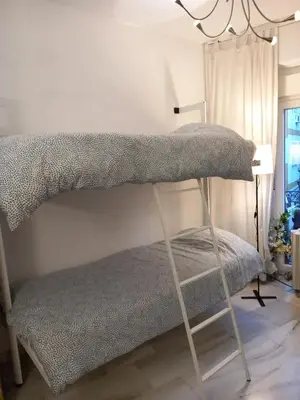 Cama o camas de una habitación en Apartamento en el centro histórico de Sevilla