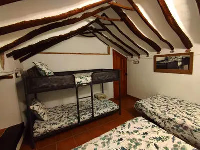 Cama o camas de una habitación en Alojamiento Rural Los Limones