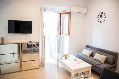 Una televisión o centro de entretenimiento en Apartamento las setas