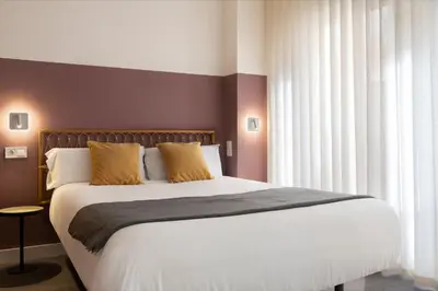 Cama o camas de una habitación en Espíritu Santo Suite Apartment