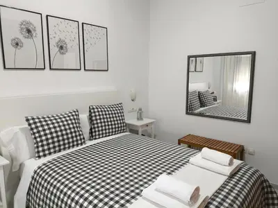 Cama o camas de una habitación en Apartamento acogedor - piscina - parking