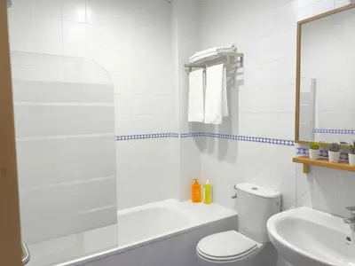 Un baño de Apartamento acogedor - piscina - parking