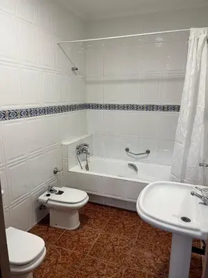 Un baño de Apartamentos La Fuente
