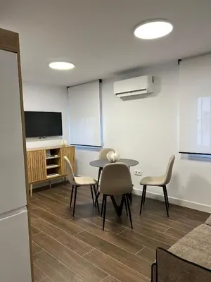 Una televisión o centro de entretenimiento en Apartamento Manzana