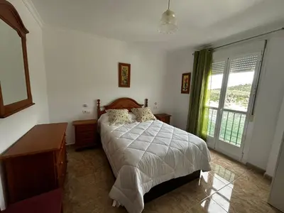 Cama o camas de una habitación en chalet adosado La morena cerca del caminito del rey