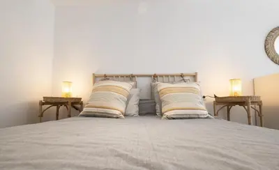 Cama o camas de una habitación en RentalSevilla Alejo Fernández II