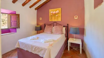 Cama o camas de una habitación en Cortijo Cuscurro Riogordo by Ruralidays