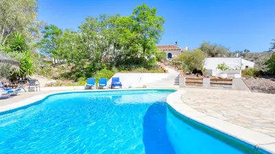 Piscina en o cerca de Cortijo Cuscurro Riogordo by Ruralidays